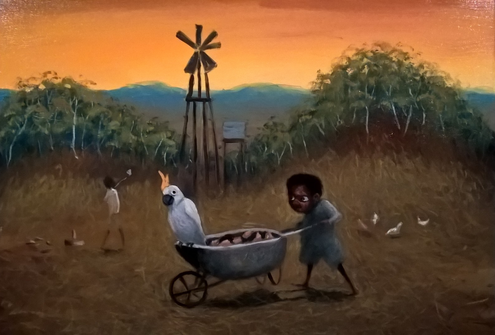 Dipinto aborigeno di Jacob Stengl: bambino che trasporta carriola con cacatua